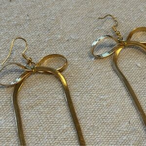 gold bow statement earrings brand